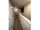 Hallway with carpet, and white doors at 116 Deer Xing, Temple, GA 30179