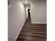 View of hallway features hard surface floors and gray paint at 116 Deer Xing, Temple, GA 30179