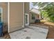 Backyard with a concrete patio and beige siding at 2635 Carolina Rdg, Riverdale, GA 30296