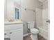 The bathroom features a shower-tub combo and neutral paint at 2635 Carolina Rdg, Riverdale, GA 30296