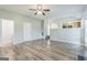 Bright living area with neutral paint, modern floors, and seamless flow to dining and kitchen at 2635 Carolina Rdg, Riverdale, GA 30296