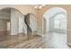 Spacious living room boasts modern floors, arched entryways, and abundant natural light at 2635 Carolina Rdg, Riverdale, GA 30296