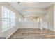 Bright living room features hardwood floors, open layout and plenty of natural light at 2635 Carolina Rdg, Riverdale, GA 30296