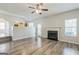 The living room overlooks the kitchen and features hardwood floors at 2635 Carolina Rdg, Riverdale, GA 30296