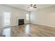 Spacious living room features a fireplace and a door to the back patio at 2635 Carolina Rdg, Riverdale, GA 30296