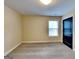 Bright bedroom with natural light and neutral carpet, paint, and trim throughout at 513 Cherry Creek Dr, Loganville, GA 30052