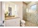 Bathroom features modern vanity, mosaic tile shower, and sleek fixtures at 105 Godby Dr, Fayetteville, GA 30215