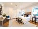 Inviting bedroom boasting hardwood floors, a plush bed, and tasteful decor at 105 Godby Dr, Fayetteville, GA 30215