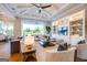 Elegant living room with stylish furnishings, built-in shelving, and large windows offering scenic views at 105 Godby Dr, Fayetteville, GA 30215