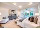 Bright main bedroom featuring hardwood floors, neutral walls, outdoor access and natural light at 105 Godby Dr, Fayetteville, GA 30215