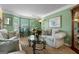 Inviting living room featuring neutral decor, plush seating, and elegant accents at 1028 Gloria Grand Blvd, Mcdonough, GA 30252
