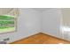 Cozy bedroom with hardwood floors, a window with natural light, and neutral decor at 1070 Elaine Dr, Forest Park, GA 30297