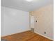 Inviting bedroom features hardwood floors, neutral walls, and ample natural light at 1070 Elaine Dr, Forest Park, GA 30297