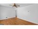 Bright living room with hardwood floors, ceiling fan, and neutral paint, ready for decor at 1070 Elaine Dr, Forest Park, GA 30297