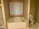 Bathroom showcasing a large soaking tub and a separate shower at 5327 Yoshino Ter, Powder Springs, GA 30127