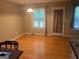 Cozy breakfast area with a window, and hardwood floors, ideal for morning meals and casual dining at 5327 Yoshino Ter, Powder Springs, GA 30127