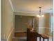 Open-concept dining area with natural light and connections to other living spaces, perfect for Gathering meals at 5327 Yoshino Ter, Powder Springs, GA 30127
