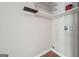 Bright laundry room with storage shelving and convenient hookups at 4448 Janice Dr, Snellville, GA 30039