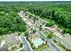 Overhead shot of a lovely neighborhood featuring community pool and manicured landscaping at 140 Rehobeth Way, Fayetteville, GA 30214