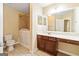 Bathroom featuring walk-in tub, vanity with drawers, and large mirror at 140 Rehobeth Way, Fayetteville, GA 30214
