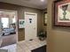 Hallway view of fitness center, exercise equipment and bright lighting at 140 Rehobeth Way, Fayetteville, GA 30214