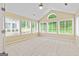 Sun room with many windows offering abundant natural light and views at 140 Rehobeth Way, Fayetteville, GA 30214