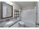Bathroom features vanity with granite countertop and shower-tub combo at 35 Deep Springs Way, Covington, GA 30016