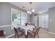 Cozy breakfast nook with natural light and adjacent laundry area at 35 Deep Springs Way, Covington, GA 30016