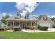 Charming single-Gathering home with a welcoming front porch and meticulously maintained landscaping at 35 Deep Springs Way, Covington, GA 30016