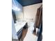 Cozy bathroom with cream walls, tile flooring, and shower/tub combination at 225 Second St, Bowdon, GA 30108