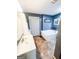 Updated bathroom features a soaking tub, tile floors, vanity with large sink and great lighting at 225 Second St, Bowdon, GA 30108