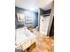 Bathroom features a soaking tub, walk-in shower, neutral walls and tile flooring at 225 Second St, Bowdon, GA 30108
