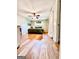 Cozy bedroom features hardwood floors, natural light, and neutral paint tones at 225 Second St, Bowdon, GA 30108