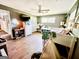 Bedroom features laminate floors, ample floor space, grey walls, and a white daybed at 225 Second St, Bowdon, GA 30108
