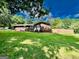 Charming brick home with a well-manicured lawn and inviting front entrance at 225 Second St, Bowdon, GA 30108