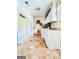 Utility room featuring white cabinetry, sink and washer/dryer hookups at 225 Second St, Bowdon, GA 30108