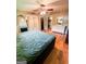 Main bedroom boasts hardwood floors, ensuite access, and natural light at 225 Second St, Bowdon, GA 30108
