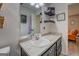 Bathroom with updated vanity, ample counter space and framed mirror at 527 Malcom Rd, Covington, GA 30014