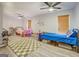 Spacious bedroom with two beds and plenty of room for playing at 527 Malcom Rd, Covington, GA 30014