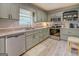 Modern kitchen featuring stainless steel appliances and light-colored countertops at 527 Malcom Rd, Covington, GA 30014