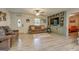 Bright, airy living room boasts hardwood floors and plenty of natural light at 527 Malcom Rd, Covington, GA 30014