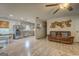 Open-concept living area with a cozy dining table adjacent to a well-lit living room at 527 Malcom Rd, Covington, GA 30014