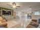 Spacious open living area with custom built-ins, modern appliances, and comfortable seating at 527 Malcom Rd, Covington, GA 30014