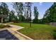 Lush green backyard with manicured lawn and landscaped perimeters at 3018 Patriots Square, Marietta, GA 30064