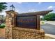 Community sign: Reserve at Marietta, with brick accents and landscaping at 3018 Patriots Square, Marietta, GA 30064