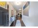 Bright entryway with hardwood floors, elegant console table, and neutral decor at 3018 Patriots Square, Marietta, GA 30064