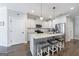 Well-lit kitchen with stainless steel appliances, ample counter space, and barstool seating at 3018 Patriots Square, Marietta, GA 30064