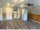 Finished basement with wood trim, flooring and two refrigerators at 4489 Northwind Dr, Ellenwood, GA 30294