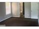 Cozy bedroom with natural light and plush carpet at 4489 Northwind Dr, Ellenwood, GA 30294