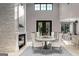 Modern dining room with stone accent wall and high ceilings at 120 Godby Dr, Fayetteville, GA 30215